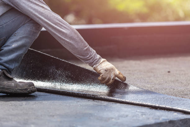 Professional Basement Waterproofing technician working in Pelham, TN